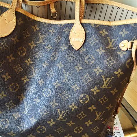 louis vuitton neverfull hot stamp